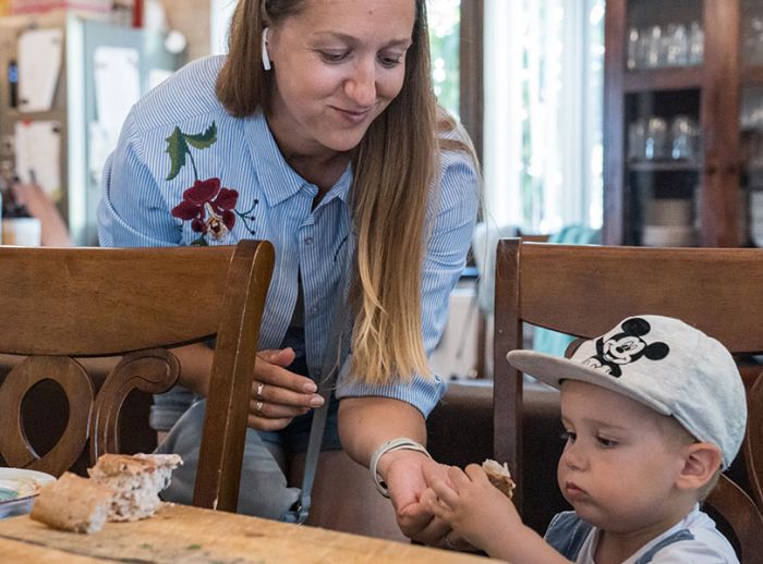 Katerina and her son taking part in cooking activity