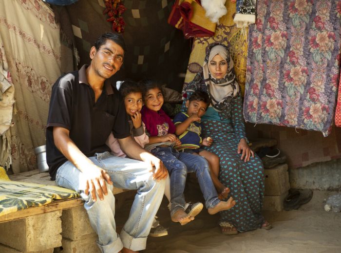 Eilaf and her husband Ahmed with their children