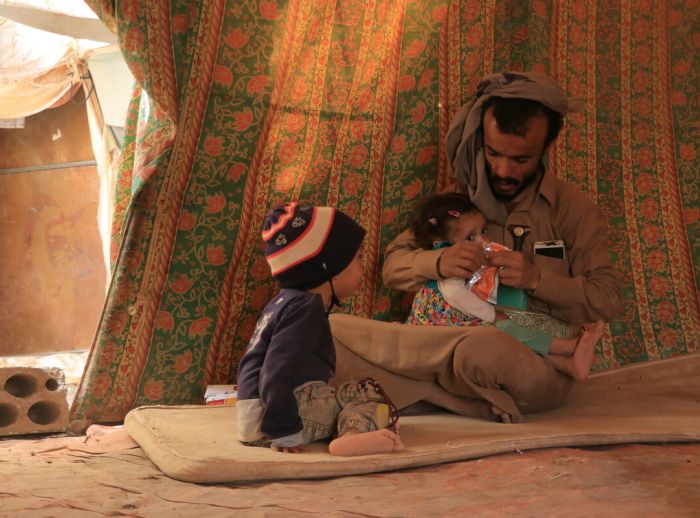 Mufethel Ahmed Ahmed Ismail Al-HaraziI and his children inside their accommodation