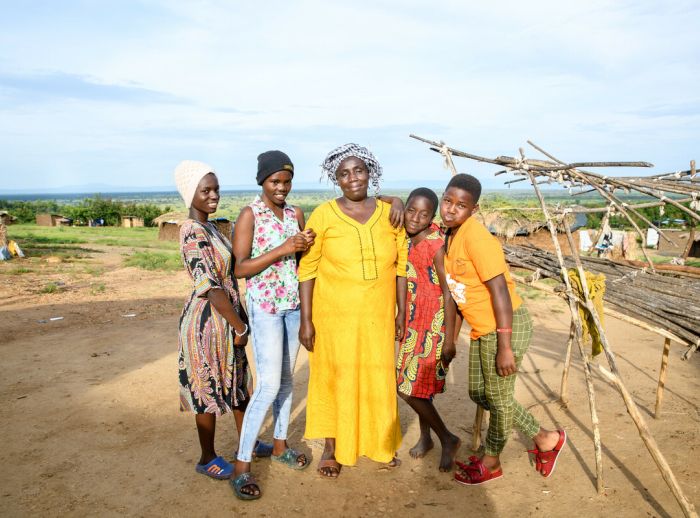 Rehema in a group photo with some of her children