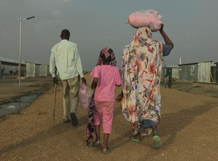 Khamis Adam Mohammed, 33, and his family arrive at the transit centre in Renk after arriving from war torn Sudan.