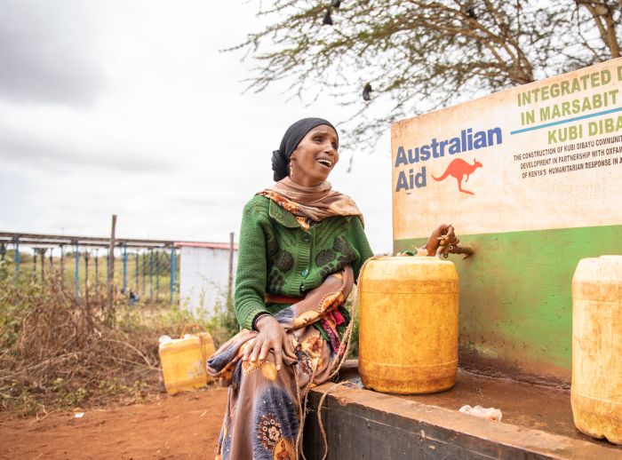 Halima Galma fetches clean water at a borehole-supported community water point in Kubi Dibayu, Marsabit.