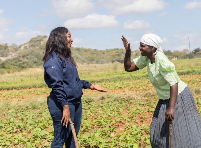 Maria Mweneziko with Nicole Mubikah (Monitoring, Evaluation, Accountability and Learning officer for Oxfam) in Gutu District, Zimbabwe.