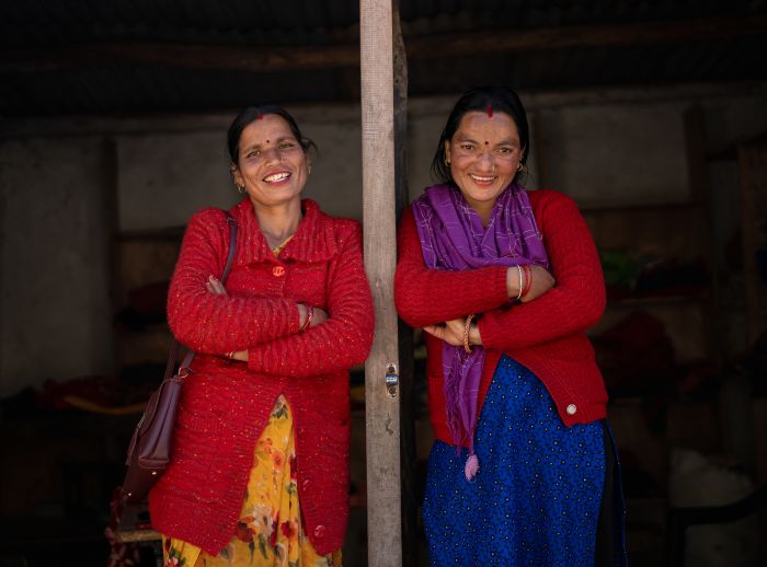 Pramila Bhul (left) and Reshma Kumari Nepali at her tailoring shop.