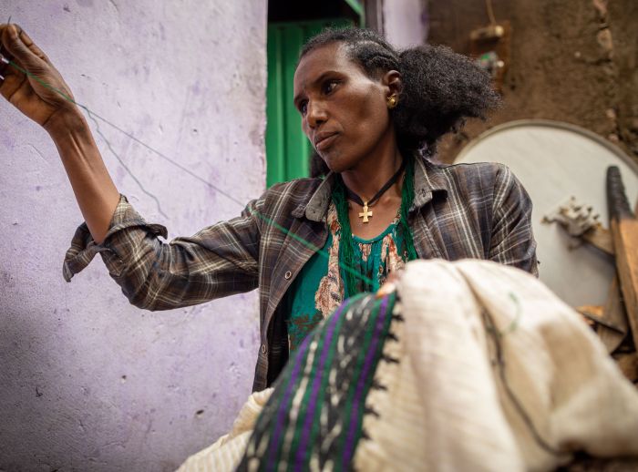 Wizeru Mesfin, 35, single woman, embroiders and sells clothing
