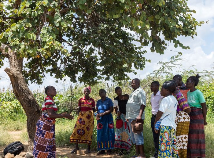 Angela Chiyala speaking with her community