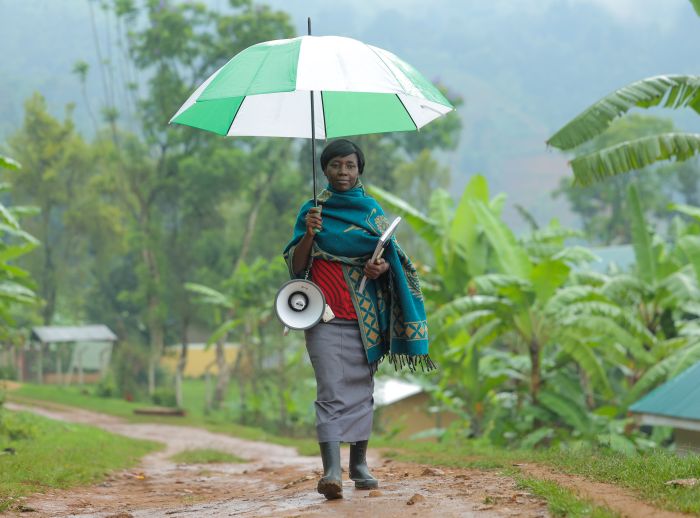 Khanakwa Naume, 39 years, Zesui Village, Sironko district uses a megaphone to alert community members, urging them to take early action based on warning signals after reading the river guage.