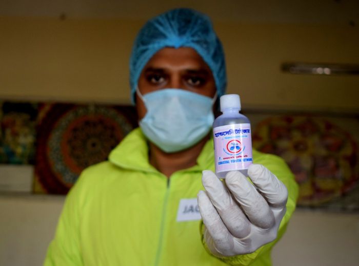 Duke Ivn Amin, shown here with hand sanitizer made and distributed by JAGO NARI.