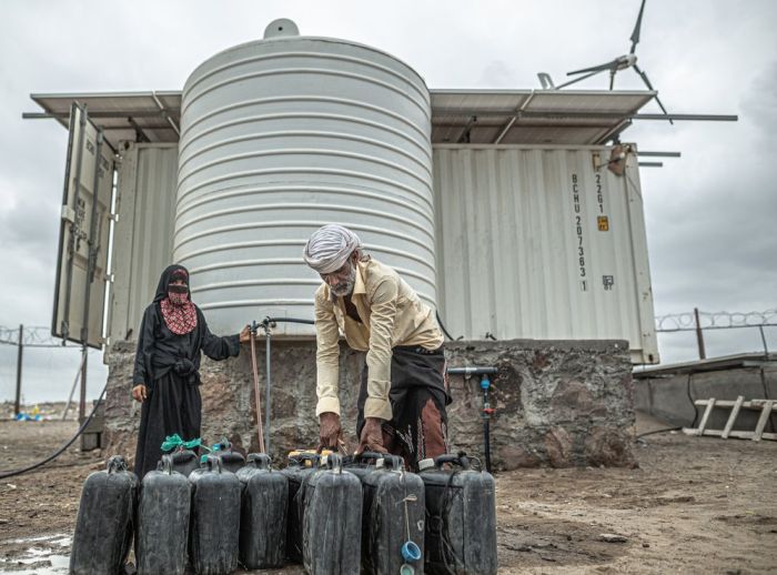 Oxfam built a water desalination system powered by wind and solar energy on the west coast of Yemen to help families get clean water.