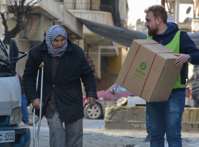 Elderly man receives winter box