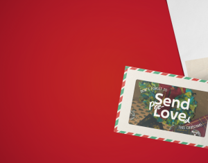 Send Pre-Loved print at home postcard on a red festive background