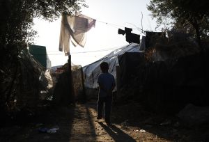 child in camp in greece