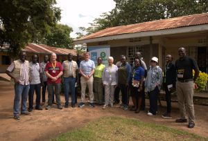 Board Member and Oxfam CEO with Uganda partners