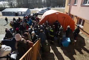 Refugees at a small transit centre in Łodyna