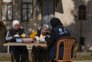 Matiya Women's Cooperative members prepare meals for survivors of the disaster in the courtyard of Nahıl Guesthouse.
