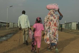 A family walking down a road