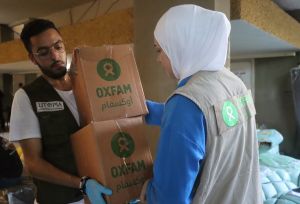 Oxfam and partners distributing Menstrual Hygiene Management kits at a collective shelter for displaced people in North Lebanon