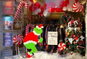Grinch window display in an Oxfam Store