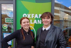 Rosie and Patrycja in Front of our Oxfam Shop