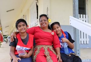 Nuka Talanoa, the principal of the Pangai Primary School in rural Ha'apai island, Tonga with her students