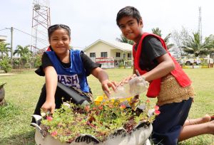 Nine year old Christopher and Nanise, are members of the WASH club at Pangai Primary School on remote Ha'apai island in Tonga. As leaders, they teach younger students proper handwashing and water conservation techniques.