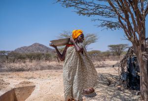 Alice Lourien carries crashes rocks.