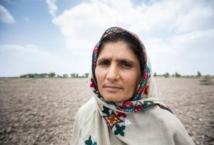 Woman looks directly at the camera