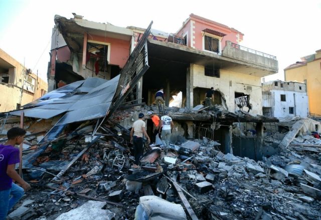 Picture of a damaged house and rubbles left after an attack in Lebanon 
