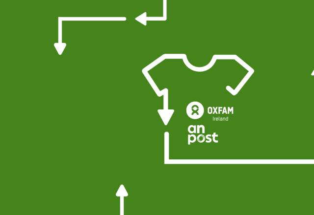 An Post and Oxfam Logo with white arrow lines forming a t-shirt