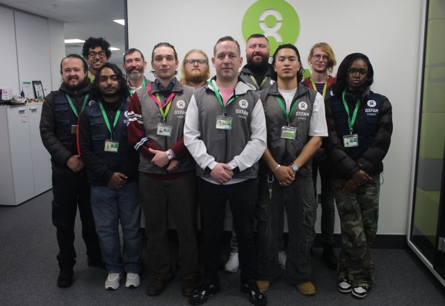 Direct Dialogue Fundraising Team Posing together in the office