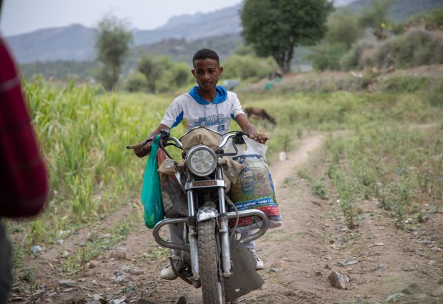 Munadhel working with his motorbike