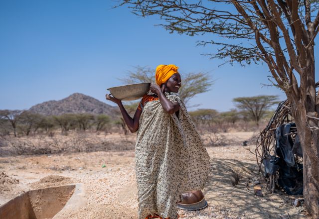 Alice Lourien carries crashes rocks.