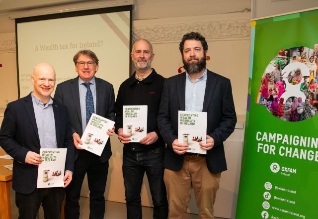 Report authors and Oxfam Ireland CEO with the report at its launch