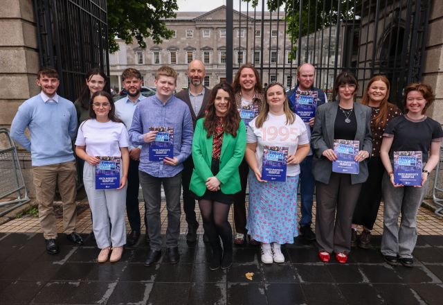 Yooung activits holding the youth manifesto in front of Leicester House in Dublin