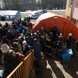 Refugees at a small transit centre in Łodyna