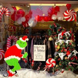 Grinch window display in an Oxfam Store