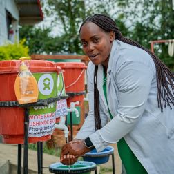 Chantal Kasemire, Head Nurse, using handwashing kit at the Shari Health Centre.