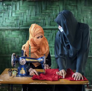Rohingya refugees sewing 