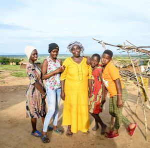 Rehema in a group photo with some of her children