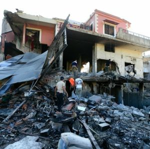 Picture of a damaged house and rubbles left after an attack in Lebanon 