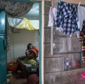 domestic worker lives in inequality and takes care of a baby